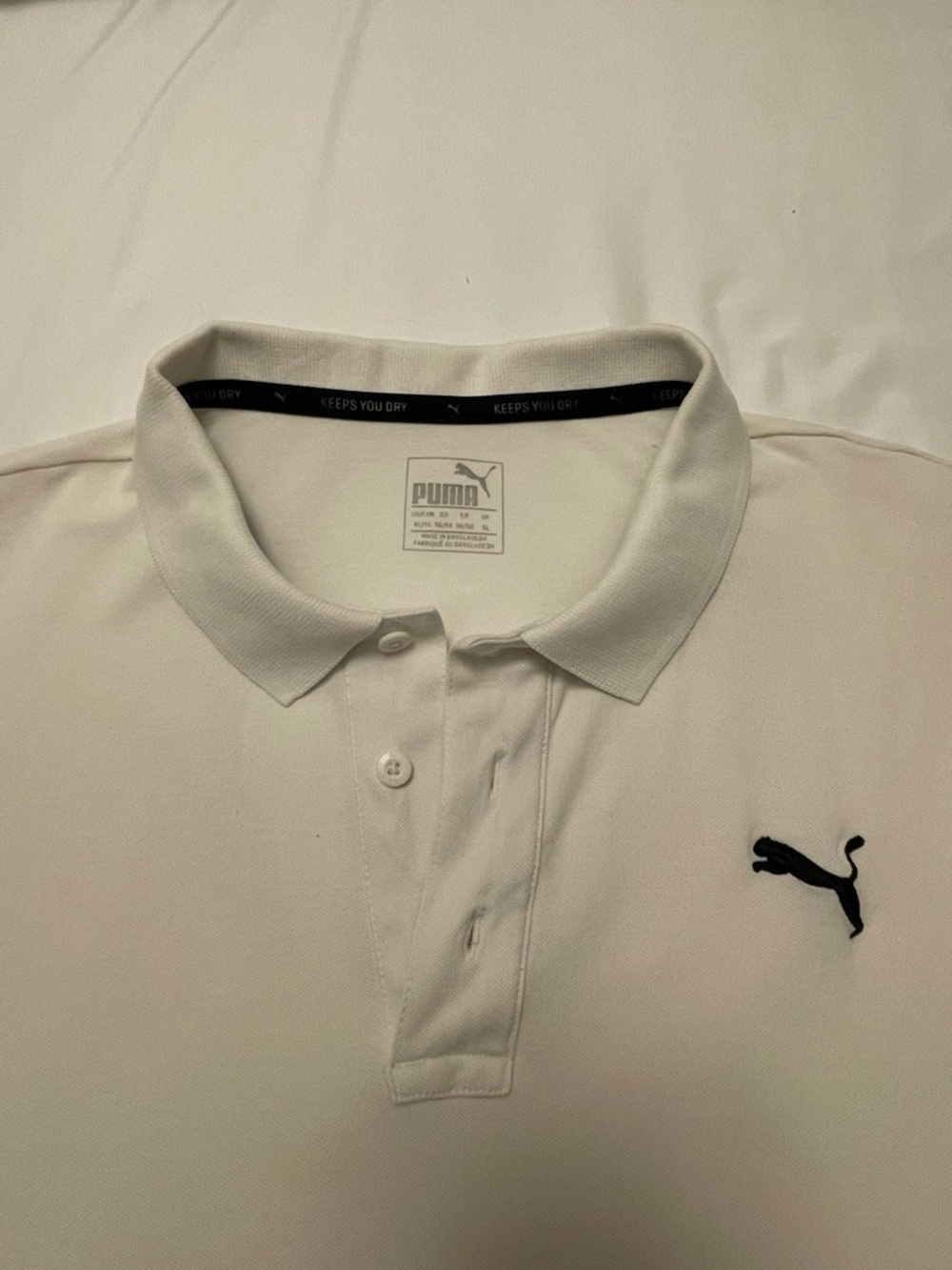Puma White Polo Shirt with Black Puma Logo